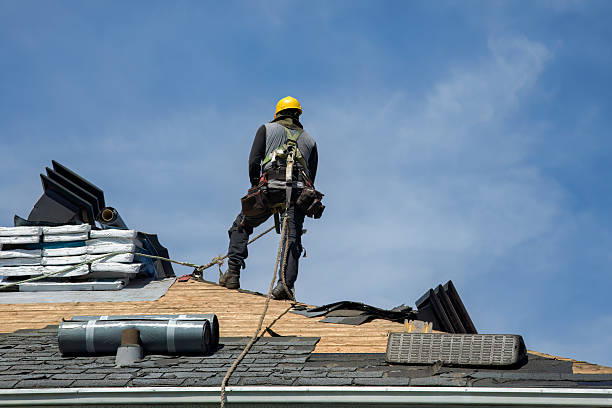 Professional Roof Replacement technician working in Marshfield, MA